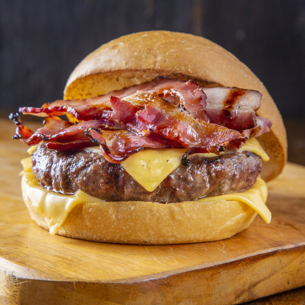 Double - 2 burgers de 150g cada, queijo cheddar, tiras de bacon